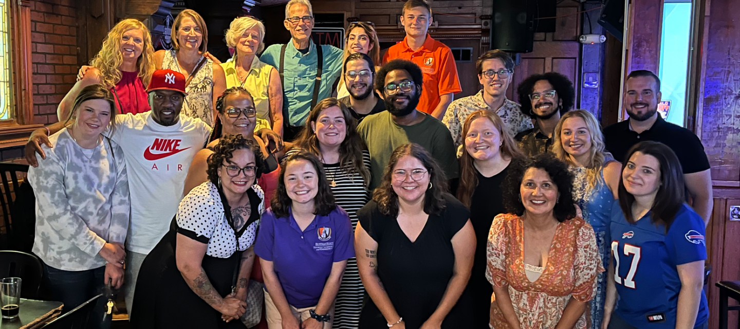 Students gather at a happy hour